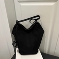 Minimalist black faux suede bucket tote bag with ring detail and shoulder strap - Black