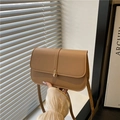 Minimalist camel flap crossbody bag with golden metal lock and matching shoulder strap - Khaki