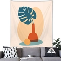 Close-up of Morandi plant tapestry showing abstract leaf and vase artwork over a sofa - 100x70(Peach Skin) / Nordic Dark Blue Monstera Vase Style (14)