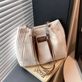 Off-white corduroy tote bag with brown leather straps and silver chain decoration - White