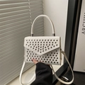 White rivet crossbody handbag with silver studs and a top handle in smooth PU leather - White