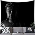 Macro detail of Zen Buddha head wall tapestry displayed over a grey fabric sofa - Style 3