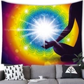 Mandala tapestry with yoga meditation silhouette above a grey sofa in a modern room - Style 13