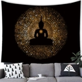 Golden mandala Buddha tapestry with black background hanging over a modern grey sofa - Style 11