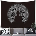 Minimalist black Buddha tapestry with white mandala pattern hanging above a living room sofa - Style 15