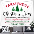 Detail of a Christmas tree tapestry hanging over a sofa in a warm festive living room - Farm Fresh Christmas Trees (5)