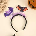 Detail shot of a purple bat headband for Halloween parties on a beige festive background - New Purple Bat Headband