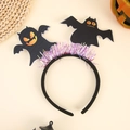 Detail of Halloween headband featuring purple tinsel and black spooky ghost characters - New Black Bat Headband