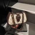 Chic beige quilted shoulder bag with brown leather trim and dual chain straps in a city style - Off White