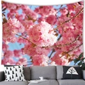 Tapisserie murale de cerisiers en fleurs roses au-dessus d'un canapé gris - 100x70(Peau de Pêche) / Sakura Rose à Pétales Doubles Plein Écran