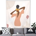 Detail of Nordic Morandi tapestry showing abstract woman portrait over a gray fabric sofa - 11 / 100x70(Peach Skin)