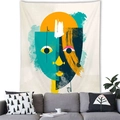 Modern abstract face tapestry hanging above a gray sofa in a cozy living room setting - 150x100cm / Peach Skin / Style 4-Geometric Mask