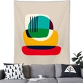 Detailed close-up of modern abstract geometric wall tapestry above a cozy sofa - High Saturation Geometric Stacking Style (8)