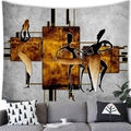 Abstract African women art tapestry hanging over a grey sofa in a modern living room - 100X70 / Yellow Brown Abstract Figures (Style 5)