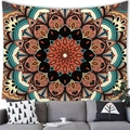 Detailed mandala tapestry with geometric patterns hanging over a modern grey sofa - 100x70(Peach Skin) / Style 12