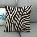 Detail shot of black zebra pattern linen pillowcase on a grey sofa with fabric texture - Classic Zebra Print / 45x45cm