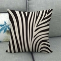 Detail of zebra pattern linen pillowcase on a gray sofa showing the rough fabric texture - Irregular Zebra Pattern / 45x45cm