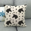 Detail of linen cushion cover showing black unicorn pattern and star texture on sofa - Unicorn Star Pattern / 45x45cm