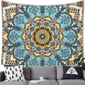 Detail of bohemian mandala tapestry featuring blue geometric patterns on a living room wall - Style 9