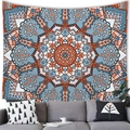 Close-up of bohemian mandala tapestry with orange and blue geometric patterns in a cozy room - Style 8