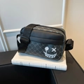 Minimalist black crossbody phone bag with white smiley graffiti and monogram print - Blue