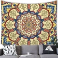 Bohemian mandala wall tapestry with vibrant geometric patterns over a gray living room sofa - Style 1 / Medium Size (Peach Skin Fabric)