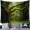 Enchanted forest treehouse wall tapestry hanging over a grey sofa in a living room - Peach Skin / 150x100cm / Vibrant Forest Landscape (2)