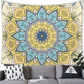 Detail view of the boho mandala tapestry with intricate patterns hanging above a grey sofa - 100x70cm / Mandala Style Five (5) - Peach Skin