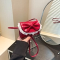 Mini red leather crossbody bag with oversized bow and white lace trim detail - Red