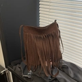 Vintage brown suede bucket bag with bohemian fringe tassels and crossbody strap - Brown