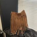 Vintage brown suede bucket bag with long tassels and shoulder strap in boho style - Brown