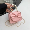 Borsa rosa texture litchi con fiocco grande, manico di perle e catena dorata - Rosa