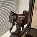 Brown faux leather crescent shoulder bag with dual front pockets and silver hardware - Brown