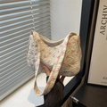 Fresh white quilted shoulder bag with pink bow patterns in soft natural sunlight - White