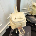 Eleganter cremefarbener Ballett-Rucksack mit Spitzenborte und Schleifen-Detail - Gelb
