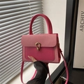 Pink textured crossbody bag with gold buckle and woven detail for women - Rose Pink