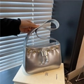 Silver metallic PU shoulder bag with gold eyelets and drawstring in minimalist Y2K style - Silver