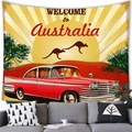 Detail of vintage Australia travel poster tapestry hung above a modern gray sofa - Peach Skin / 230X180 / Australia Red-White Car