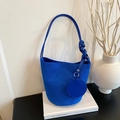 Klein blue faux suede bucket bag with woven handle detail and small round coin purse - Blue