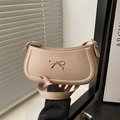 Minimalist beige bow baguette shoulder bag with golden metal buckle and adjustable strap - Khaki