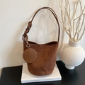 Brown frosted leather bucket bag with woven strap and mini round coin purse pendant - Brown