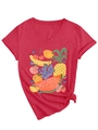 Detail of red V-neck T-shirt featuring tropical fruit prints and a stylish knotted hem - S / Red