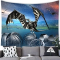 Detail of dragon tapestry hanging on wall above a sofa with stars and mountain scenery - 黑白条纹翼龙(7)