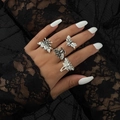 Macro shot of gothic moth and skull rings set in vintage silver finish on black lace - Antique Silver - 4 Piece Set