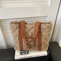 Quilted tote bag in khaki finish with brown shoulder strap and metallic snap closure - Khaki