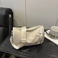 Minimalist cream white cylinder pillow bag with gold CHOU embroidery and wide strap - Light Khaki