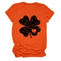 Detail of orange t-shirt featuring a vintage black clover with heart-shaped cutout - Orange (Black Text)