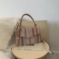 Colorful woven crossbody bag with striped design, top handle and golden chain hardware - Khaki