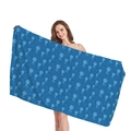 Thick beach towel with blue seahorse and wave patterns shown by a model on white background - Blue Seahorse Print(3) / 150x75cm