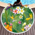 Round thick beach towel featuring tropical floral leaves, tassels, and frangipani print - Frangipani Bird of Paradise Style